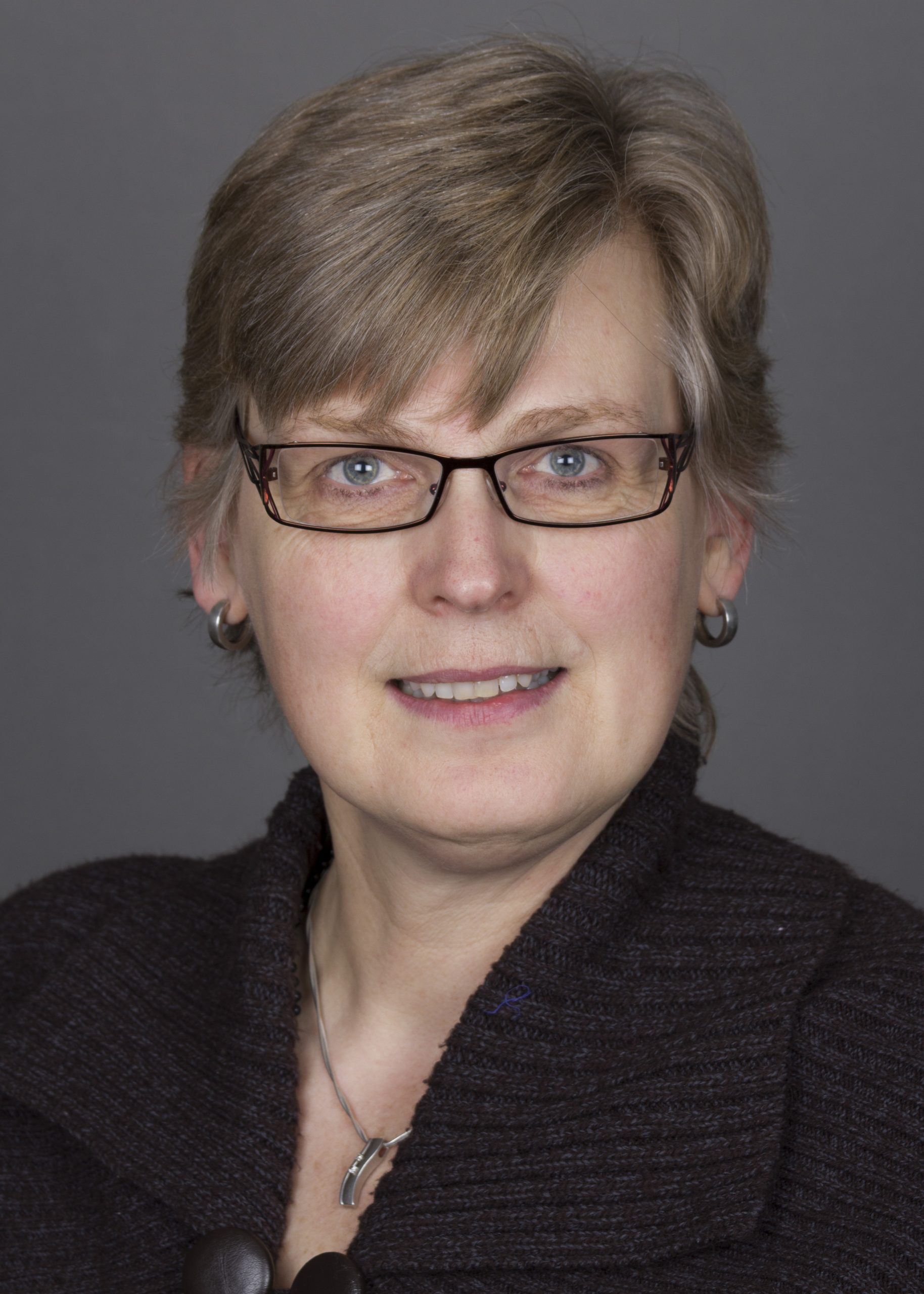 A headshot of Elke Ham.