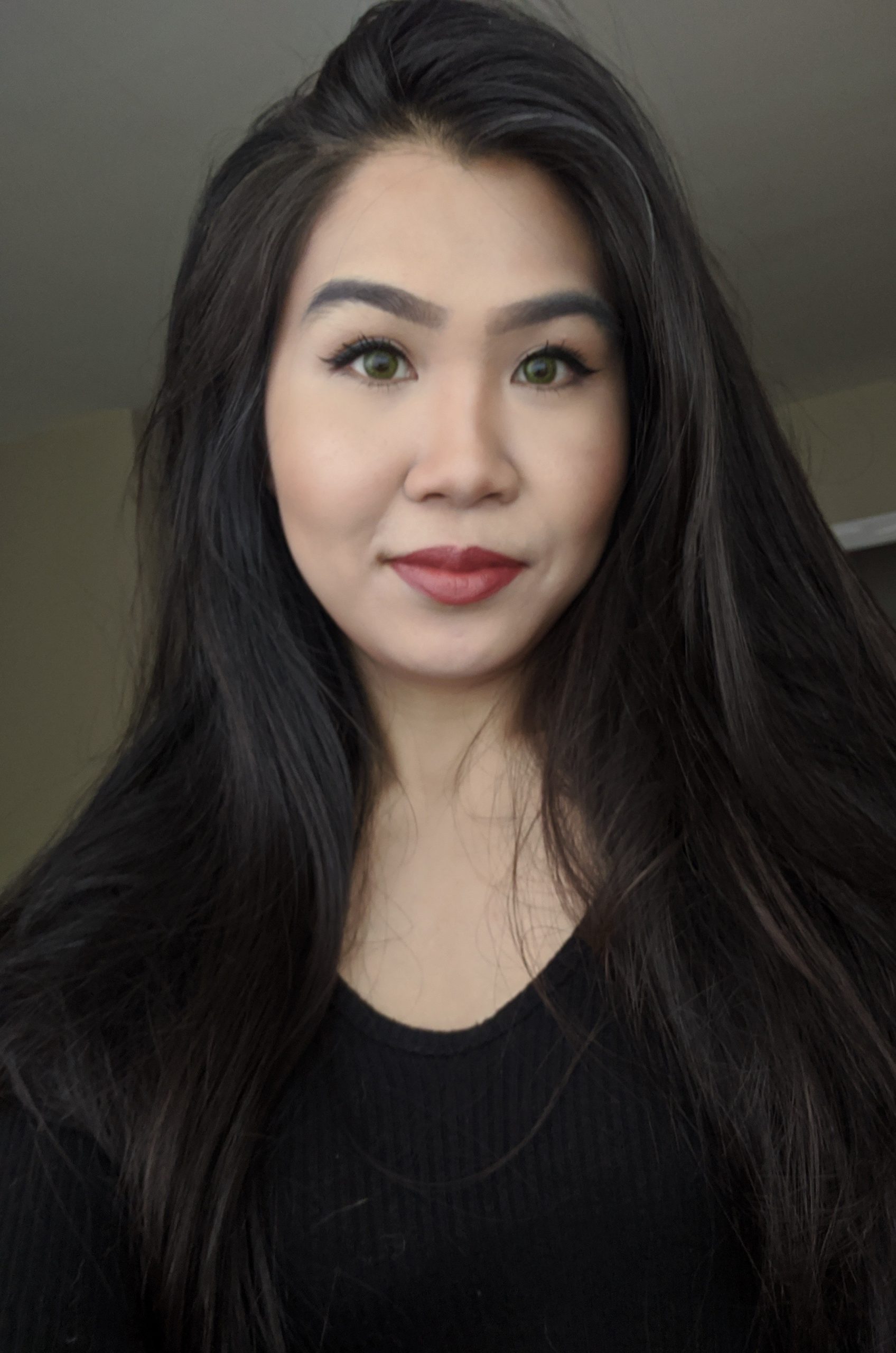 A headshot of Florence Tang.