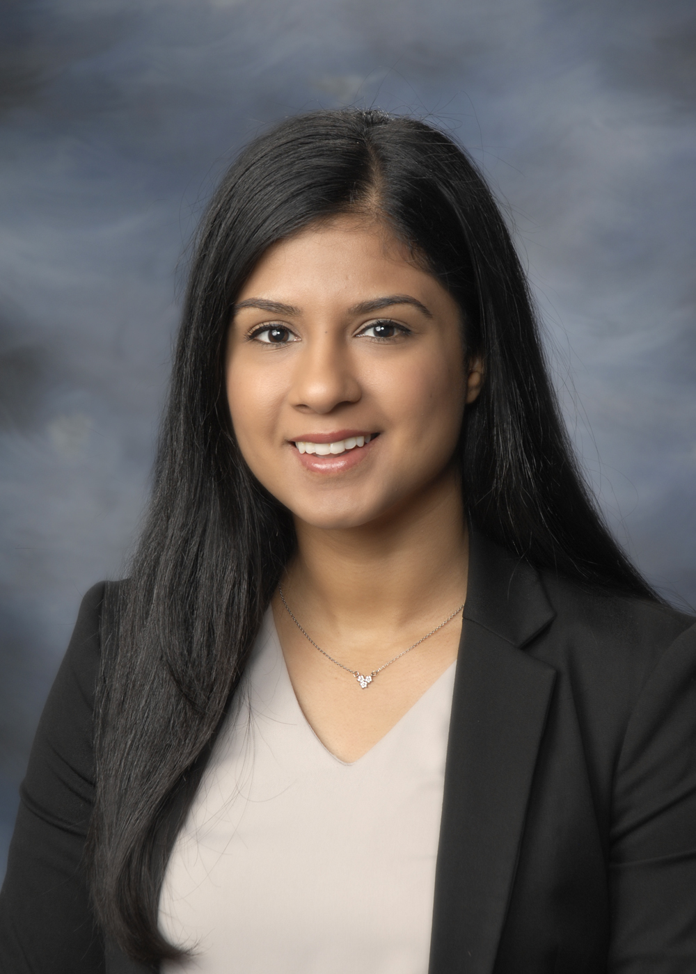 A headshot of Dr. Dhaliwal.