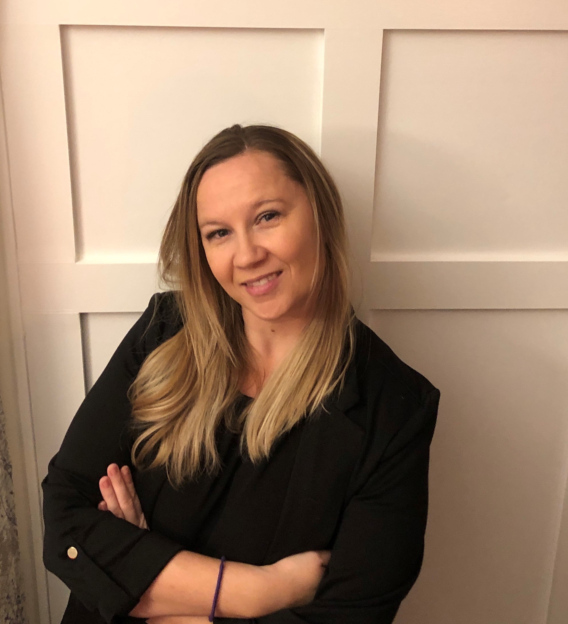 A headshot of Nicole Adams.