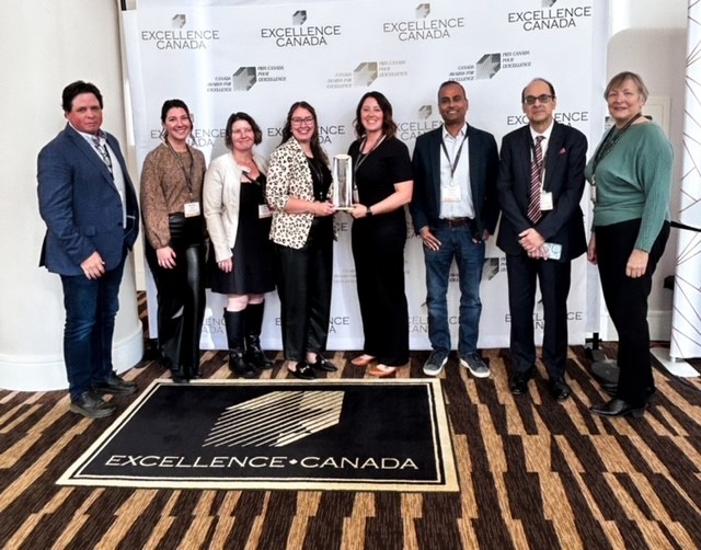 Staff accepting the Canada Award for Excellence