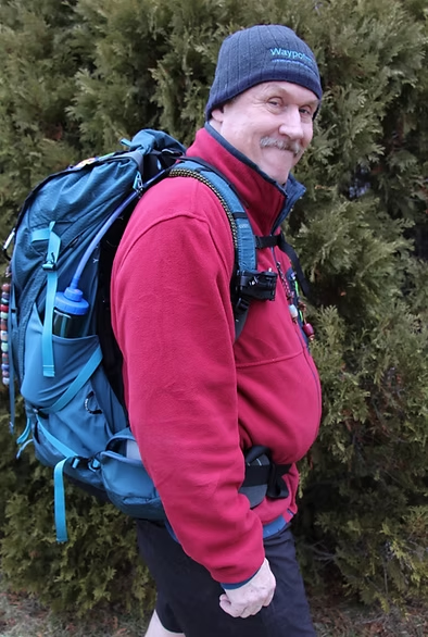 Steve Parry wearing a hiking backpack